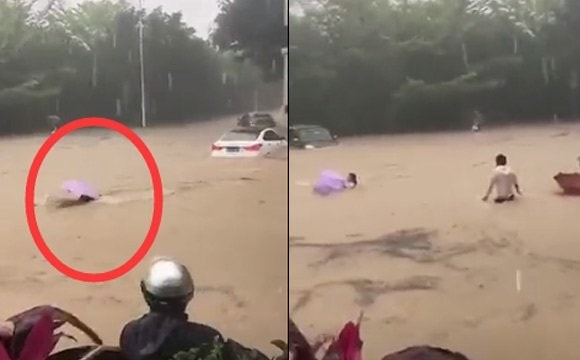 廈門女子暴雨中被洪水淹沒沖走 危急時刻的哥飛身救人現場