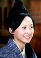 練束梅